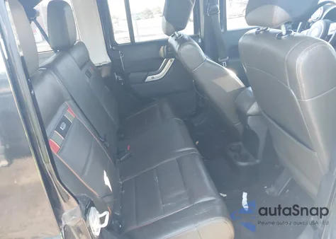 2011 Jeep Wrangler Unlimited 70Th Anniversary z USA, uszkodzony, nr VIN 1J4BA7H1XBL616117